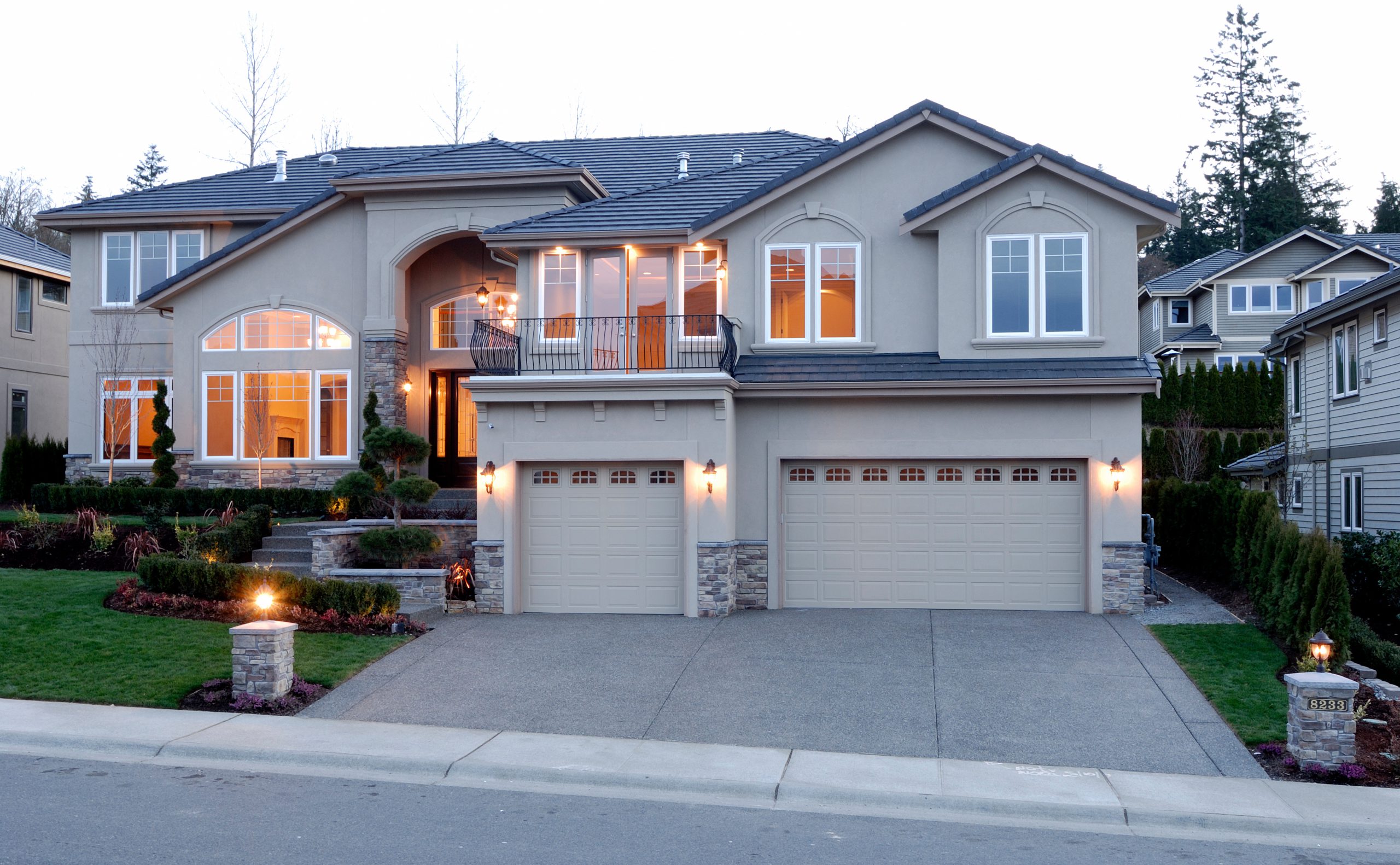 Home exterior lit by electrical contractors near me